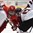 SPISSKA NOVA VES, SLOVAKIA - APRIL 21: Latvia's Daniels Berzins #12 faces-off against Artyom Anosov #18 of Belarus during relegation round action at the 2017 IIHF Ice Hockey U18 World Championship. (Photo by Andrea Cardin/HHOF-IIHF Images)

